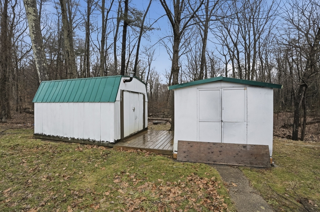 17 Conestoga Trail Brookfield, MA 01506 - Photo 19 of 20 a view of backyard with barn and a large tree