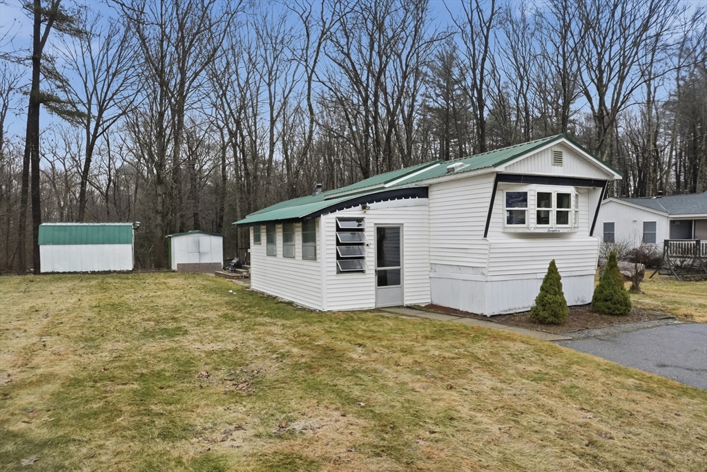 17 Conestoga Trail Brookfield, MA 01506 - Photo 2 of 20 a view of a house with a yard