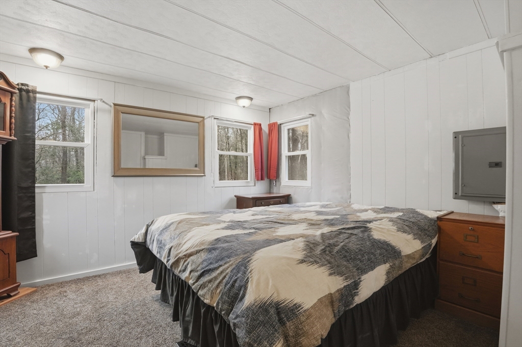 17 Conestoga Trail Brookfield, MA 01506 - Photo 10 of 20 a bedroom with a bed and wooden floor