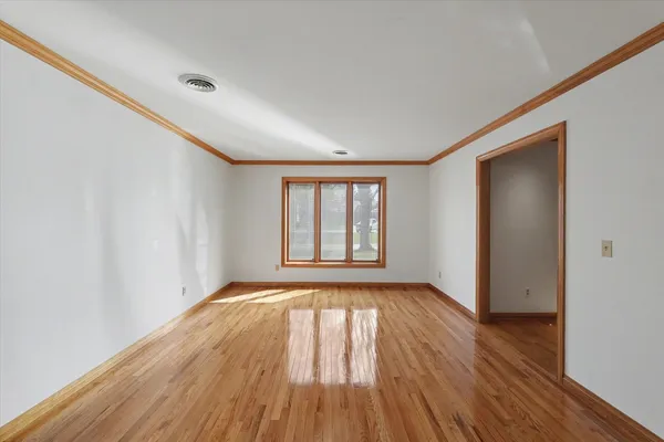 a kitchen with stainless steel appliances granite countertop a sink and dishwasher a stove with wooden floor
