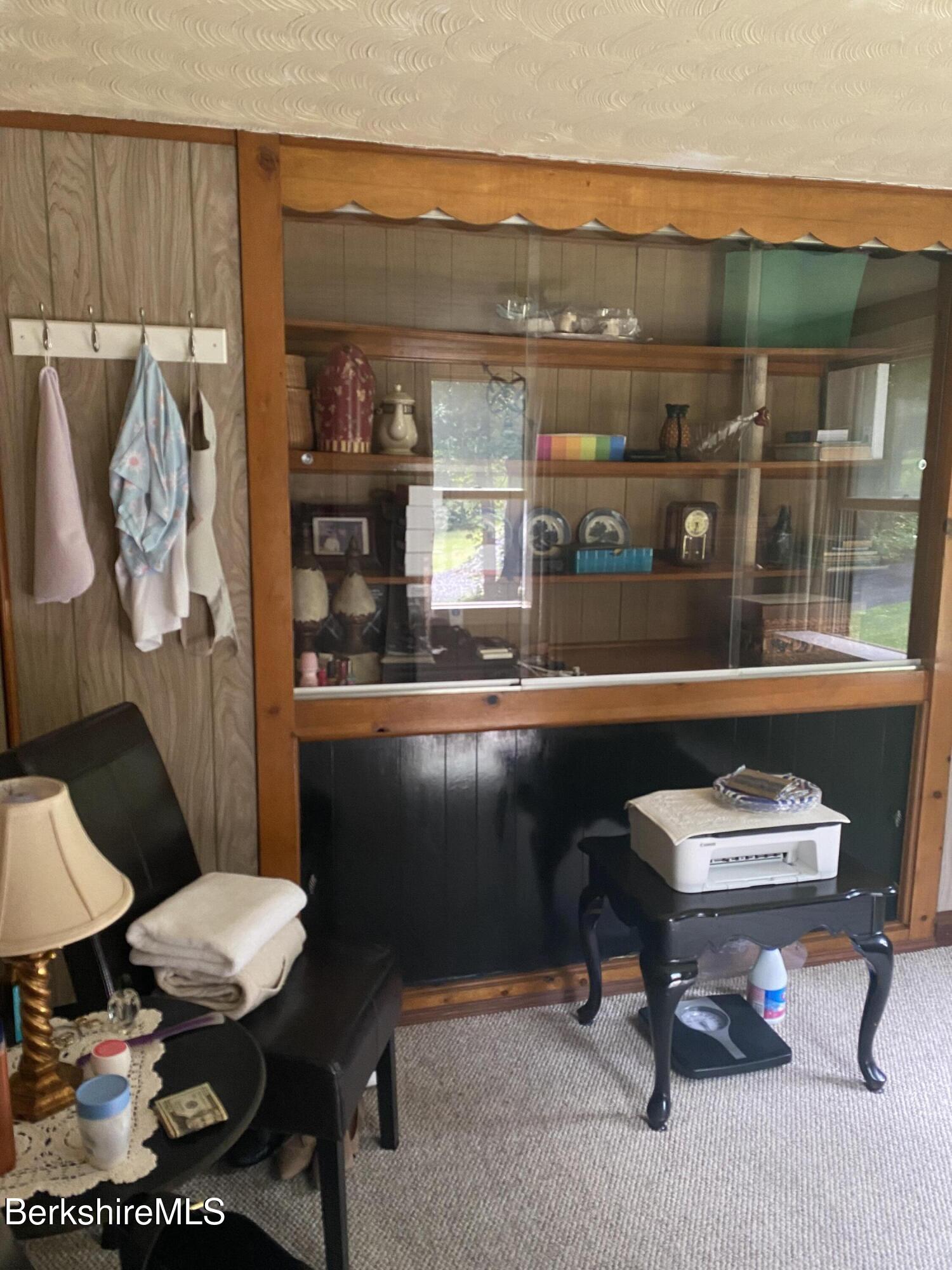 355 Laurel Street Lee, MA 01238 - Photo 12 of 19 a living room with a couch