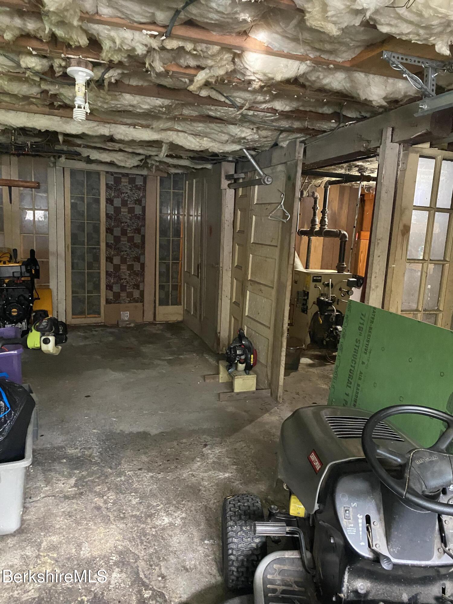 355 Laurel Street Lee, MA 01238 - Photo 19 of 19 a living room with furniture and a fireplace