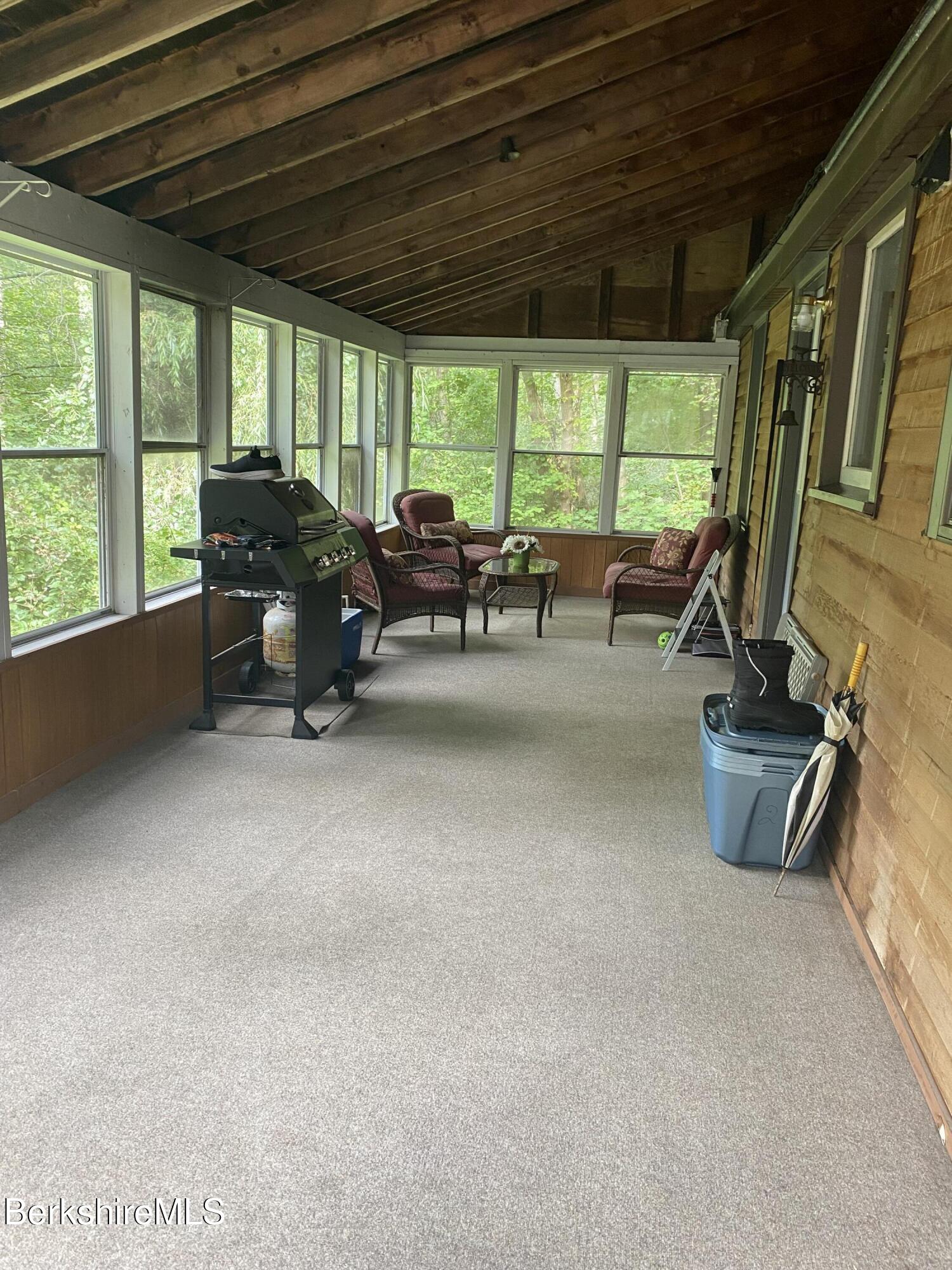 355 Laurel Street Lee, MA 01238 - Photo 4 of 19 a view of a livingroom with furniture and a window