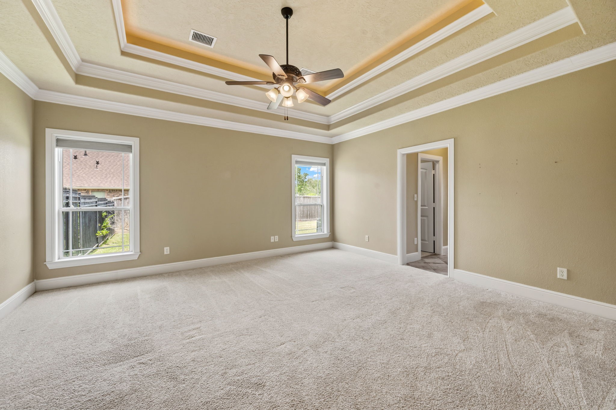 5041 Rimrock Pass Montgomery, TX 77316 - Photo 20 of 44 Primary bedroom with amazing ceilings and lighting