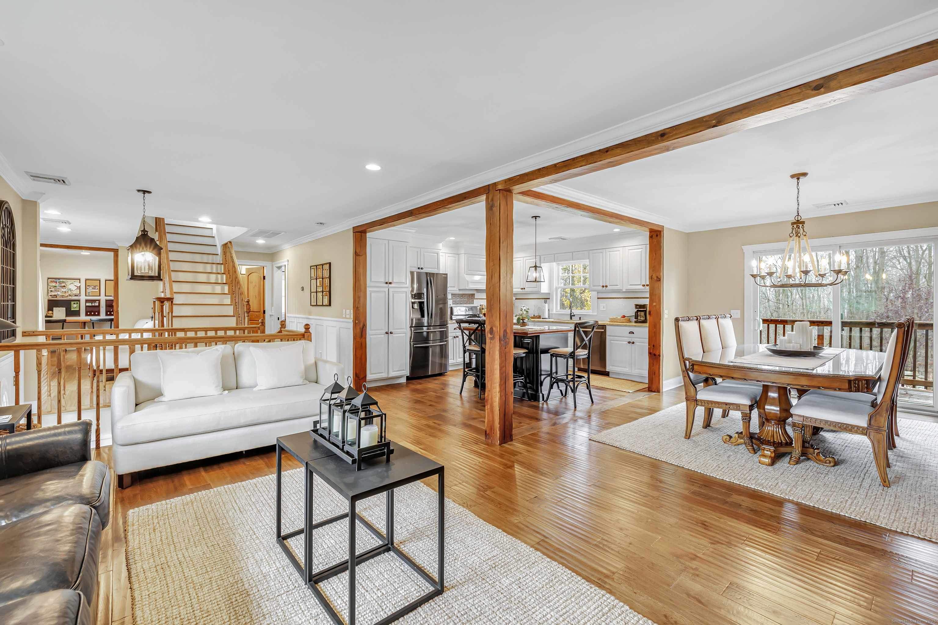 3 Great Meadow Road Danbury, CT 06811 - Photo 11 of 40 a living room with furniture and a large window