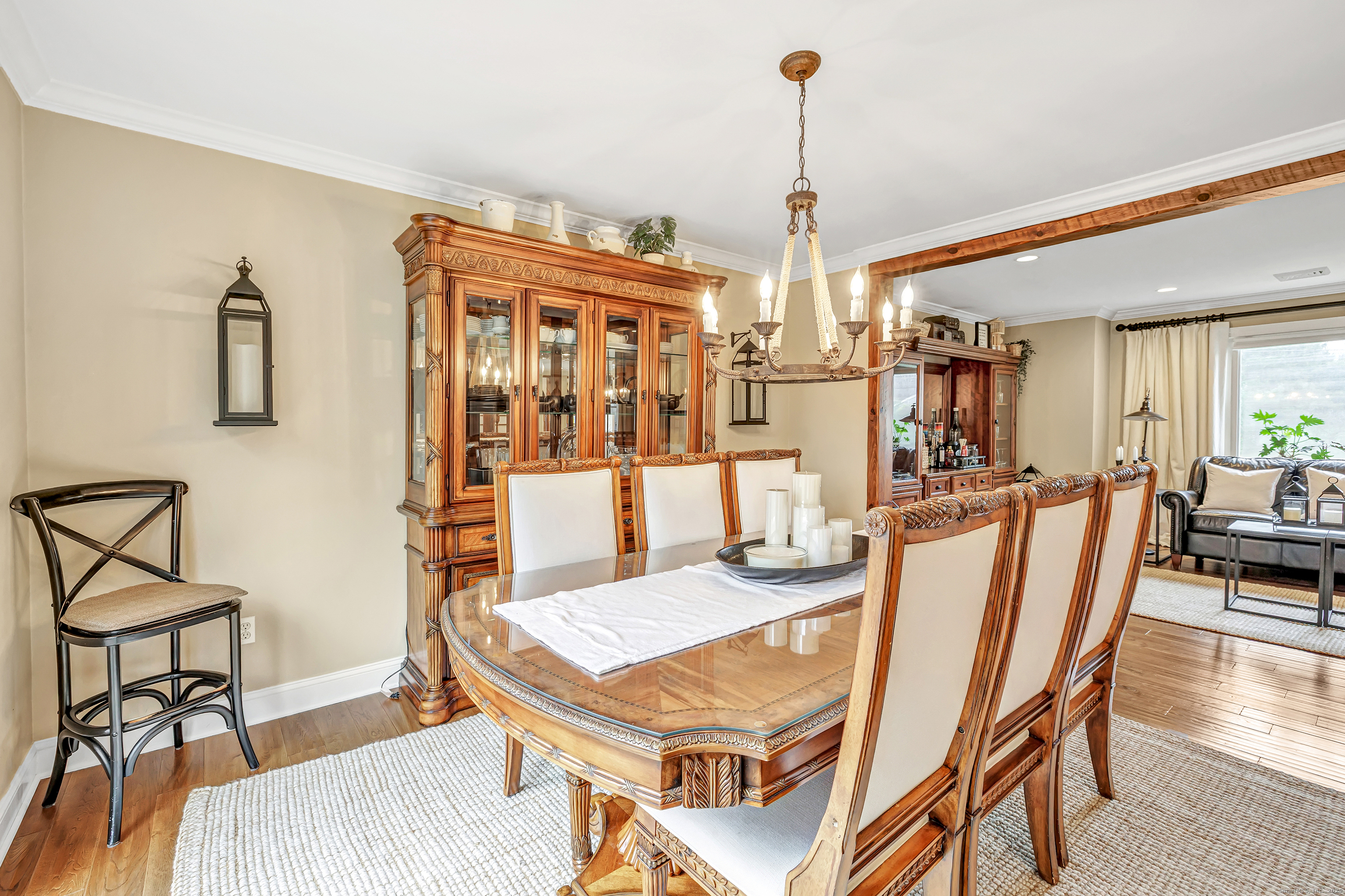 3 Great Meadow Road Danbury, CT 06811 - Photo 13 of 40 a dining room with furniture a chandelier and wooden floor