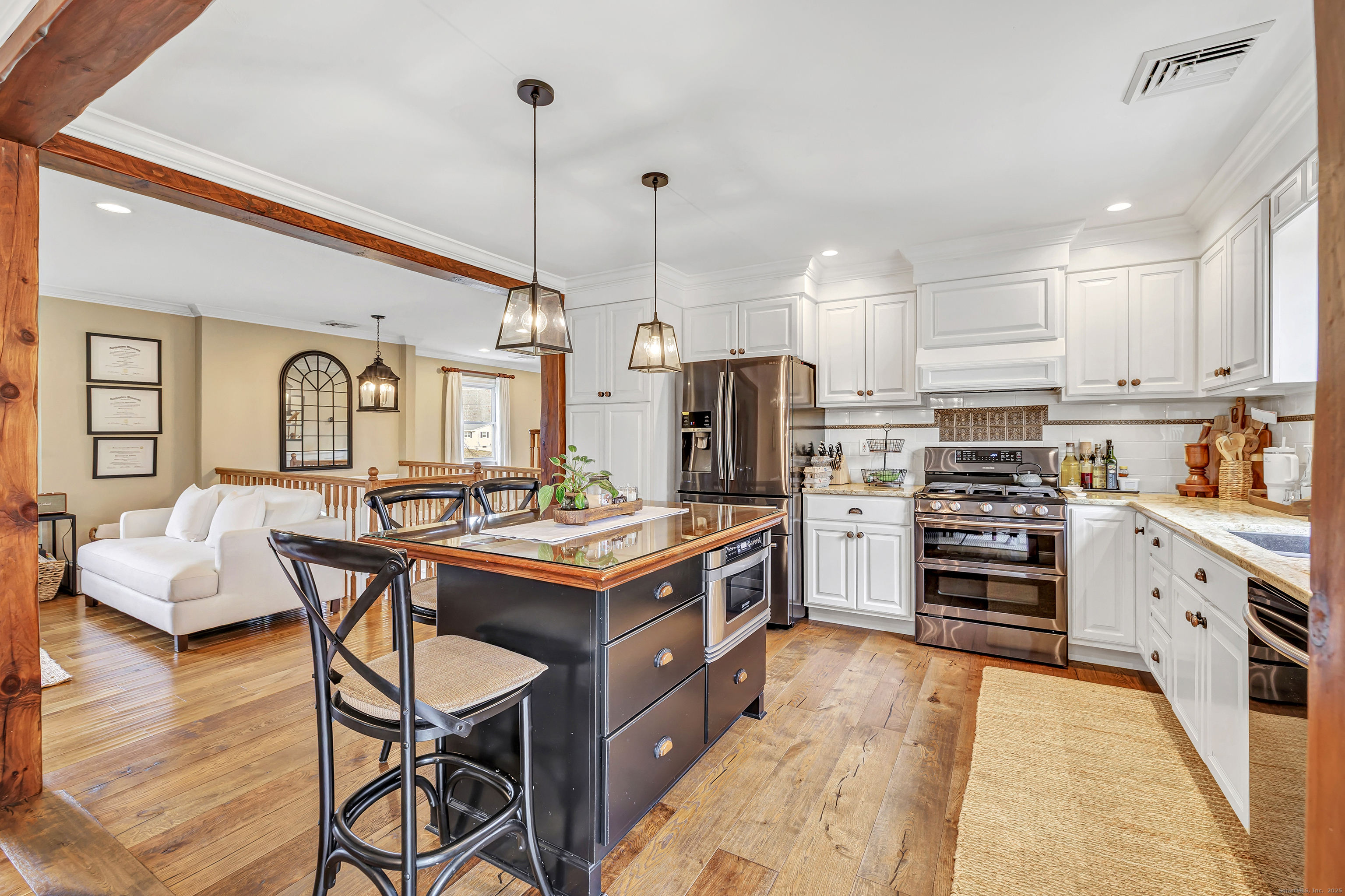3 Great Meadow Road Danbury, CT 06811 - Photo 14 of 40 a kitchen with stainless steel appliances granite countertop a stove and a refrigerator