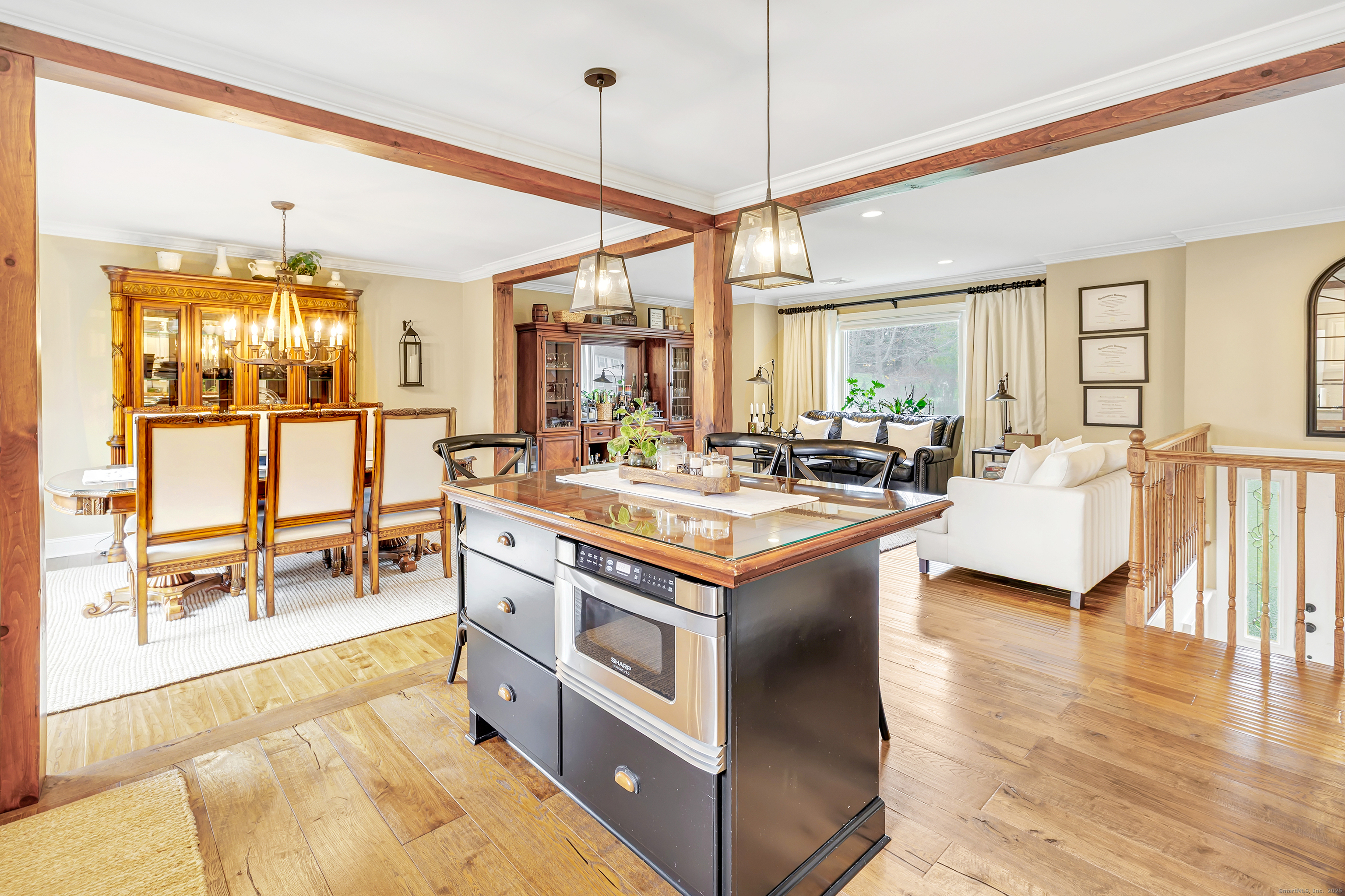 3 Great Meadow Road Danbury, CT 06811 - Photo 17 of 40 a kitchen with stainless steel appliances granite countertop a stove and a view of living room
