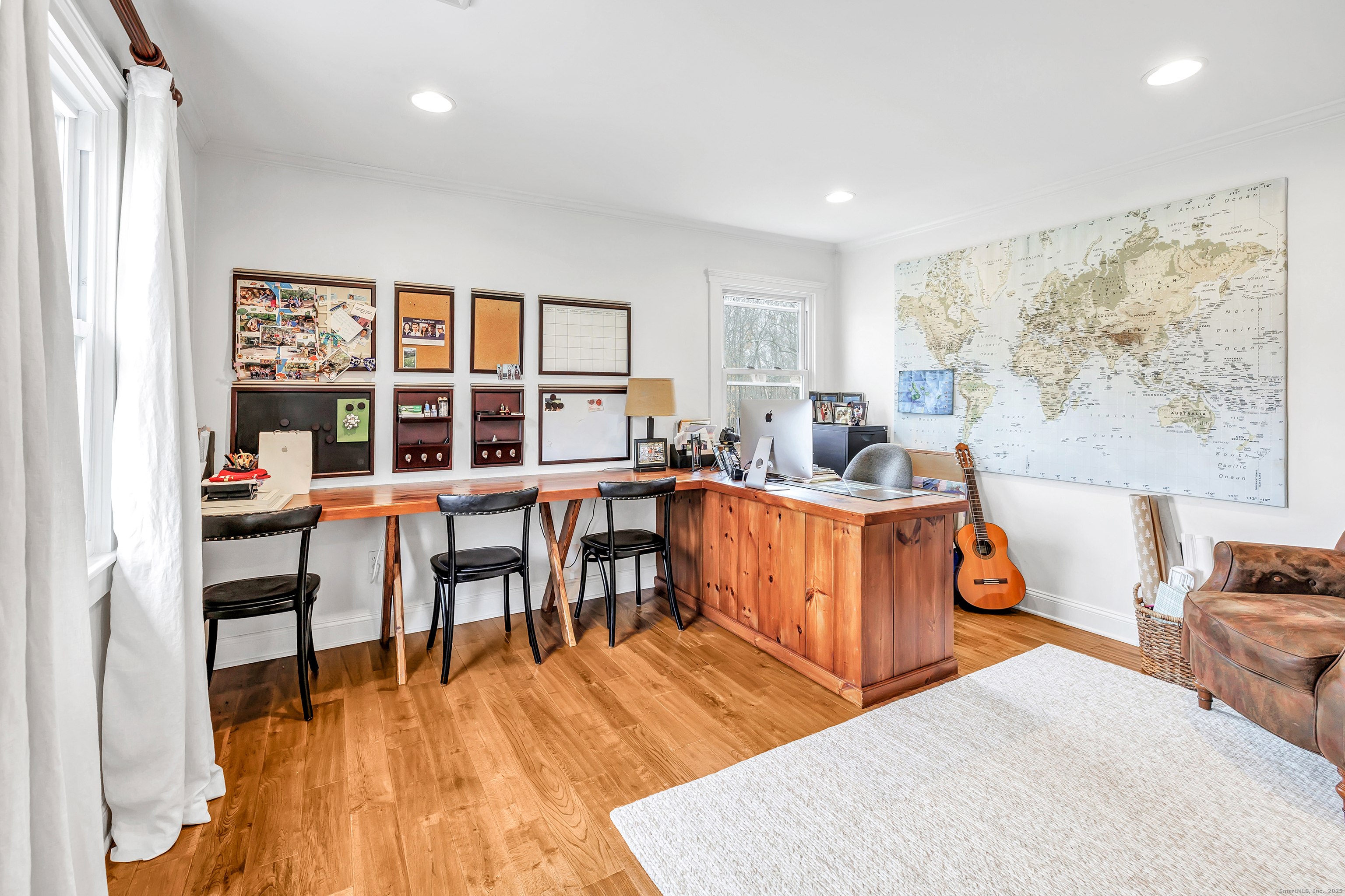 3 Great Meadow Road Danbury, CT 06811 - Photo 27 of 40 a living room with furniture and a large window
