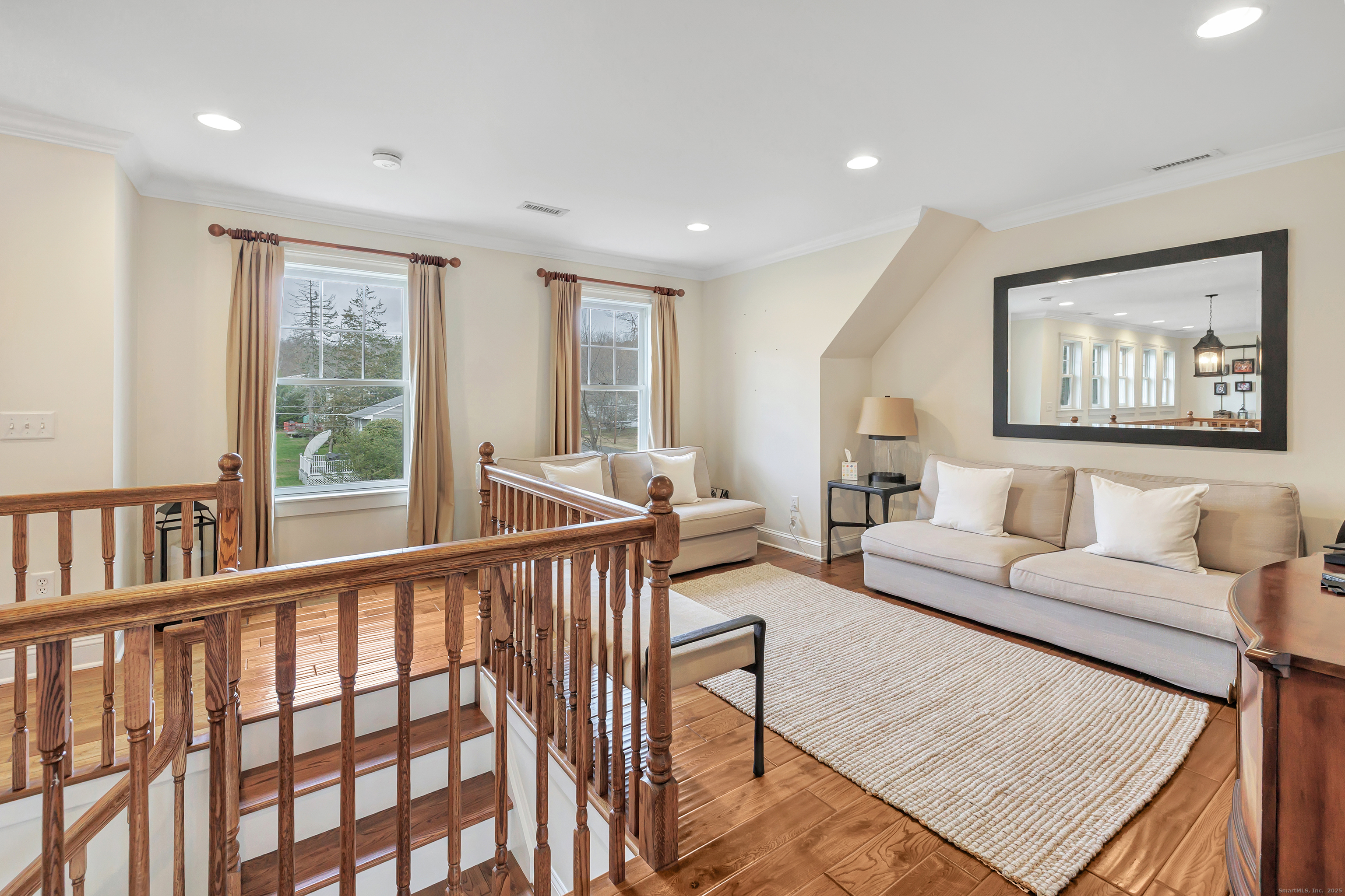 3 Great Meadow Road Danbury, CT 06811 - Photo 30 of 40 a living room with furniture and a large window