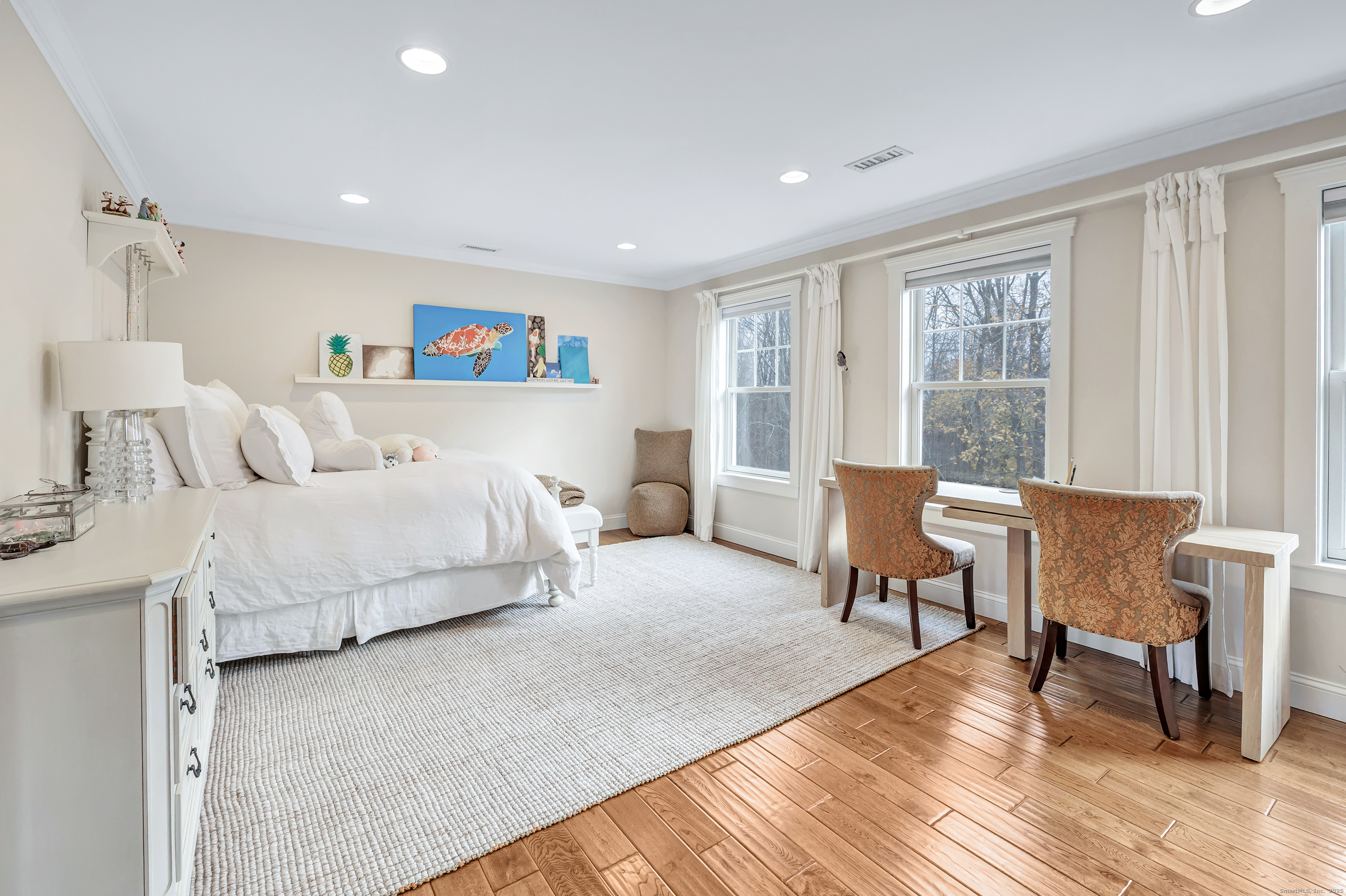 3 Great Meadow Road Danbury, CT 06811 - Photo 31 of 40 a bedroom with a bed and a large window