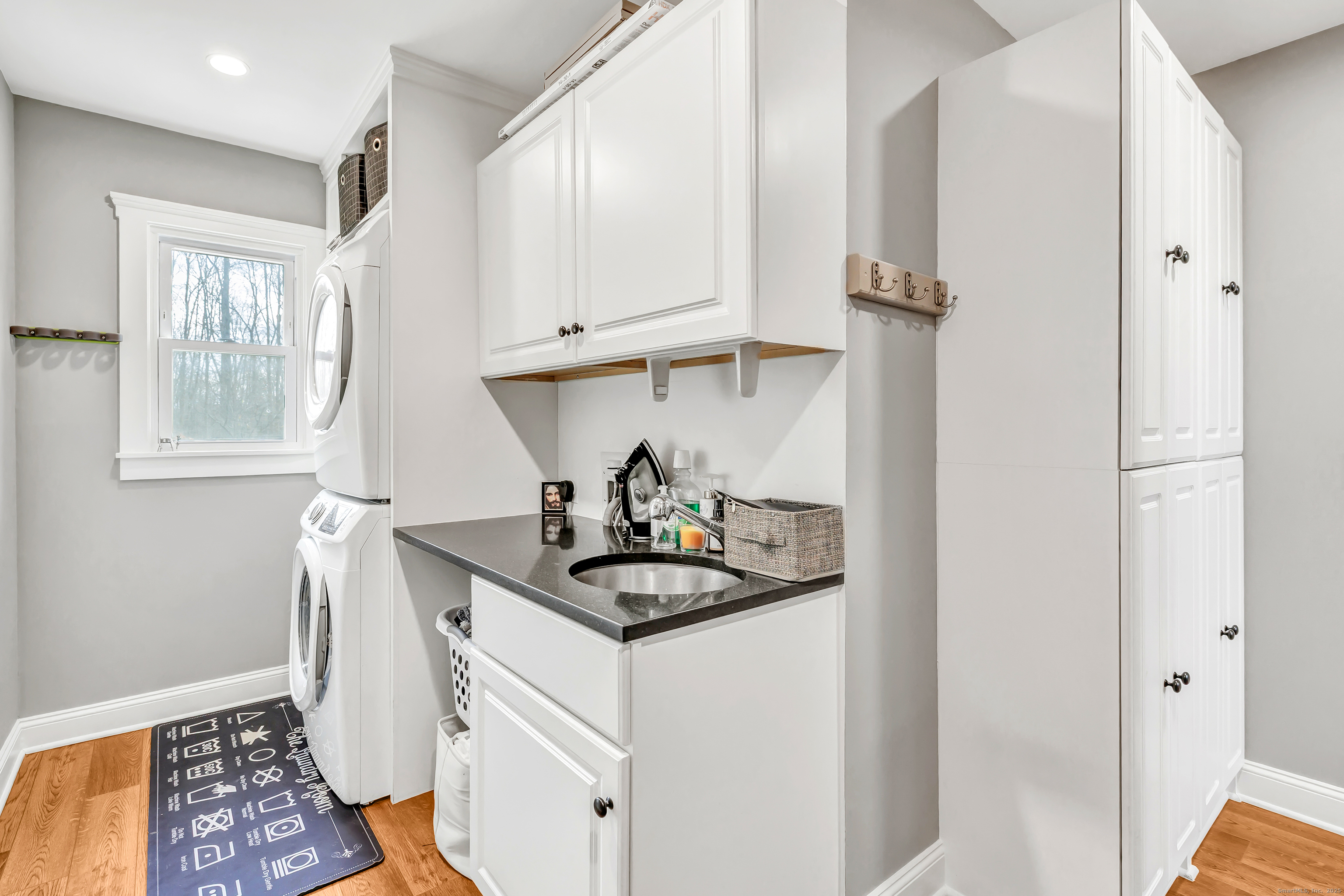 3 Great Meadow Road Danbury, CT 06811 - Photo 40 of 40 a kitchen with stainless steel appliances granite countertop a sink and a refrigerator