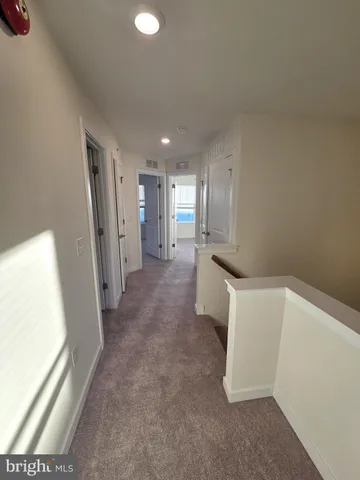 a view of hallway with stairs