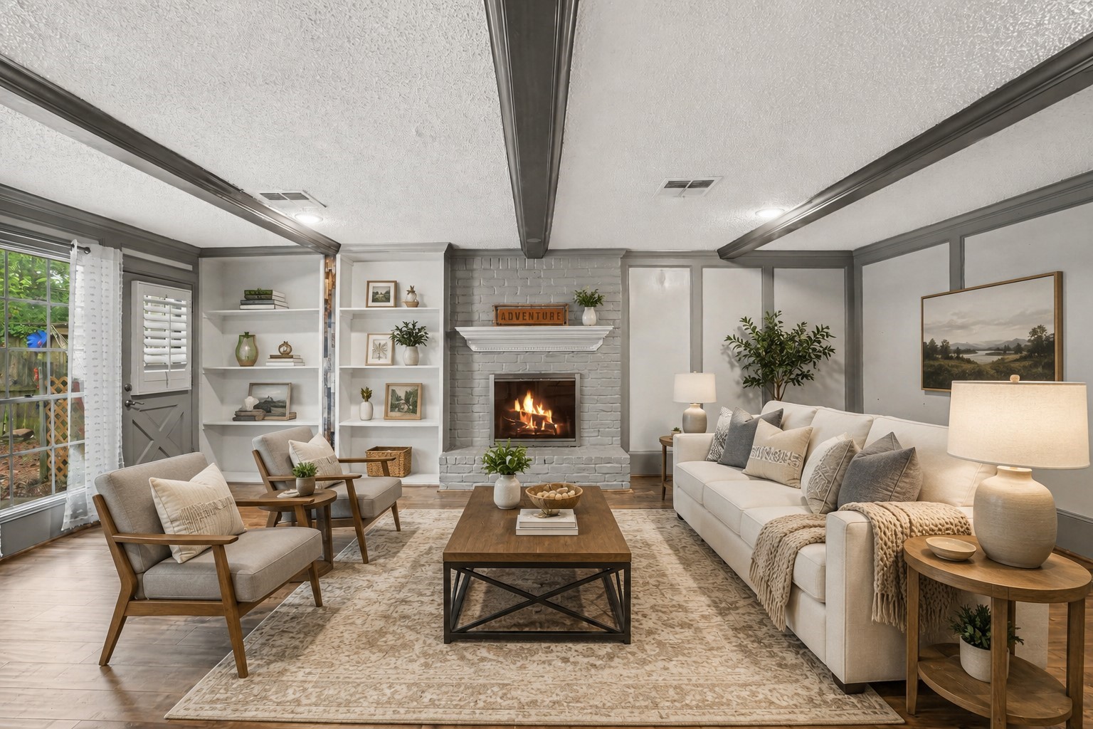 9530 Arcade Drive Spring, TX 77379 - Photo 9 of 32 Charming living room showcases custom built-ins, exposed ceiling beams, and a cozy fireplace, ideal for relaxing or entertaining guests. (Virtually Staged)
