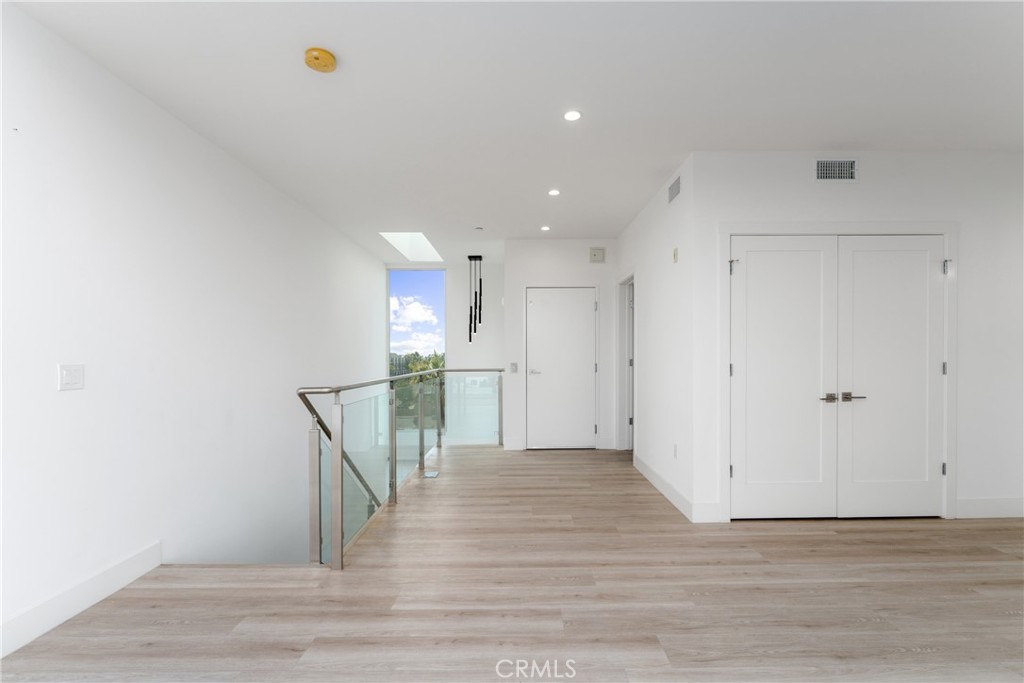 2648 State Street Carlsbad, CA 92008 - Photo 13 of 24 a view of empty room with wooden floor