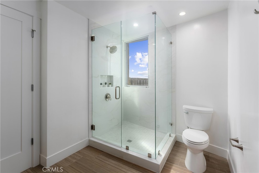 2648 State Street Carlsbad, CA 92008 - Photo 16 of 24 a bathroom with a shower toilet and sink