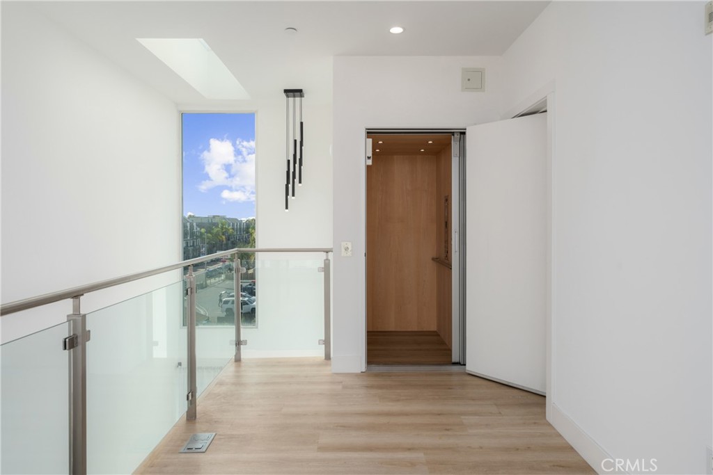 2648 State Street Carlsbad, CA 92008 - Photo 18 of 24 a view of entryway with wooden floor