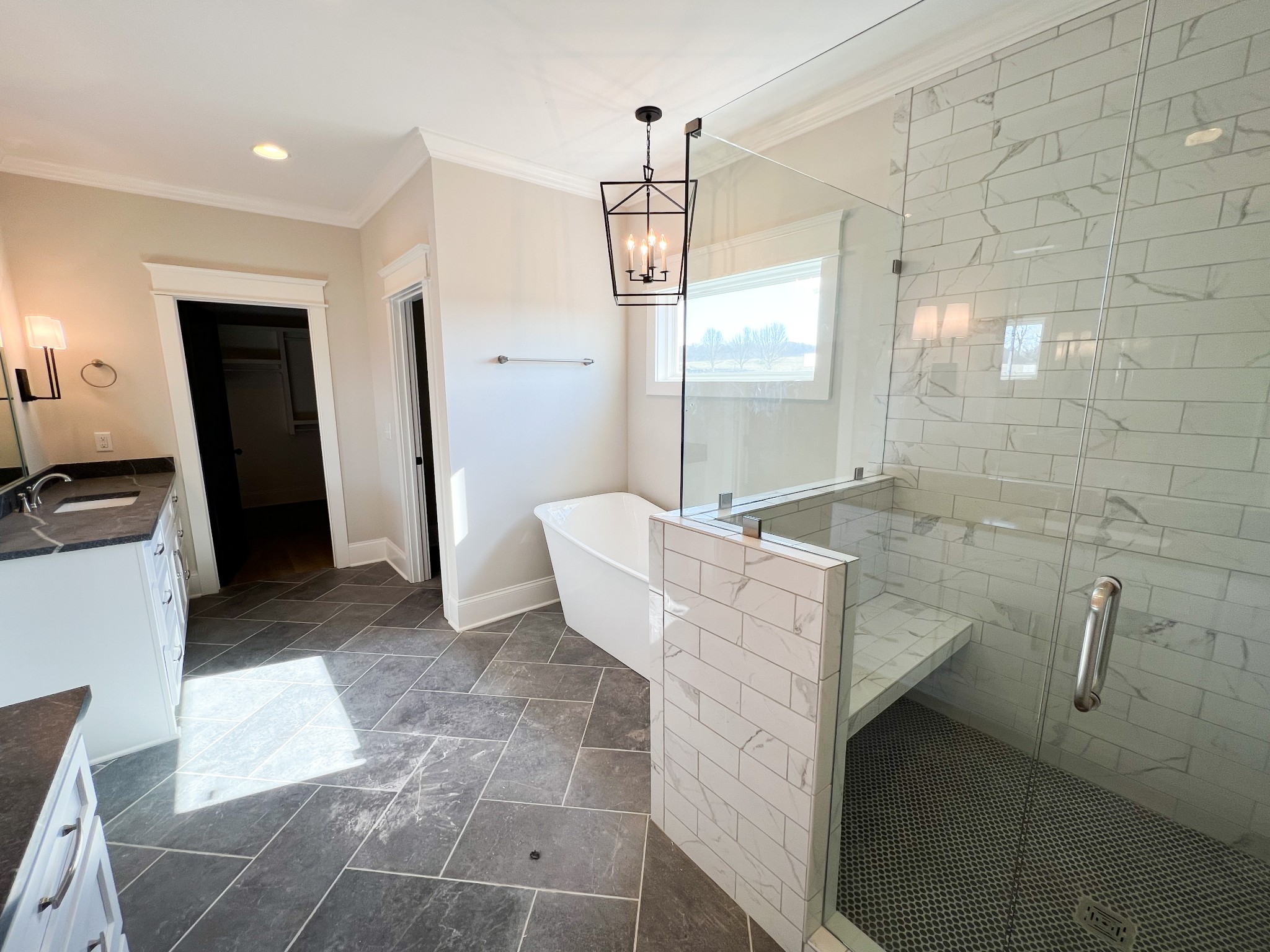 2040 Cairo Bend Road Lebanon, TN 37087 - Photo 20 of 38 a spacious bathroom with a granite countertop sink a toilet and mirror