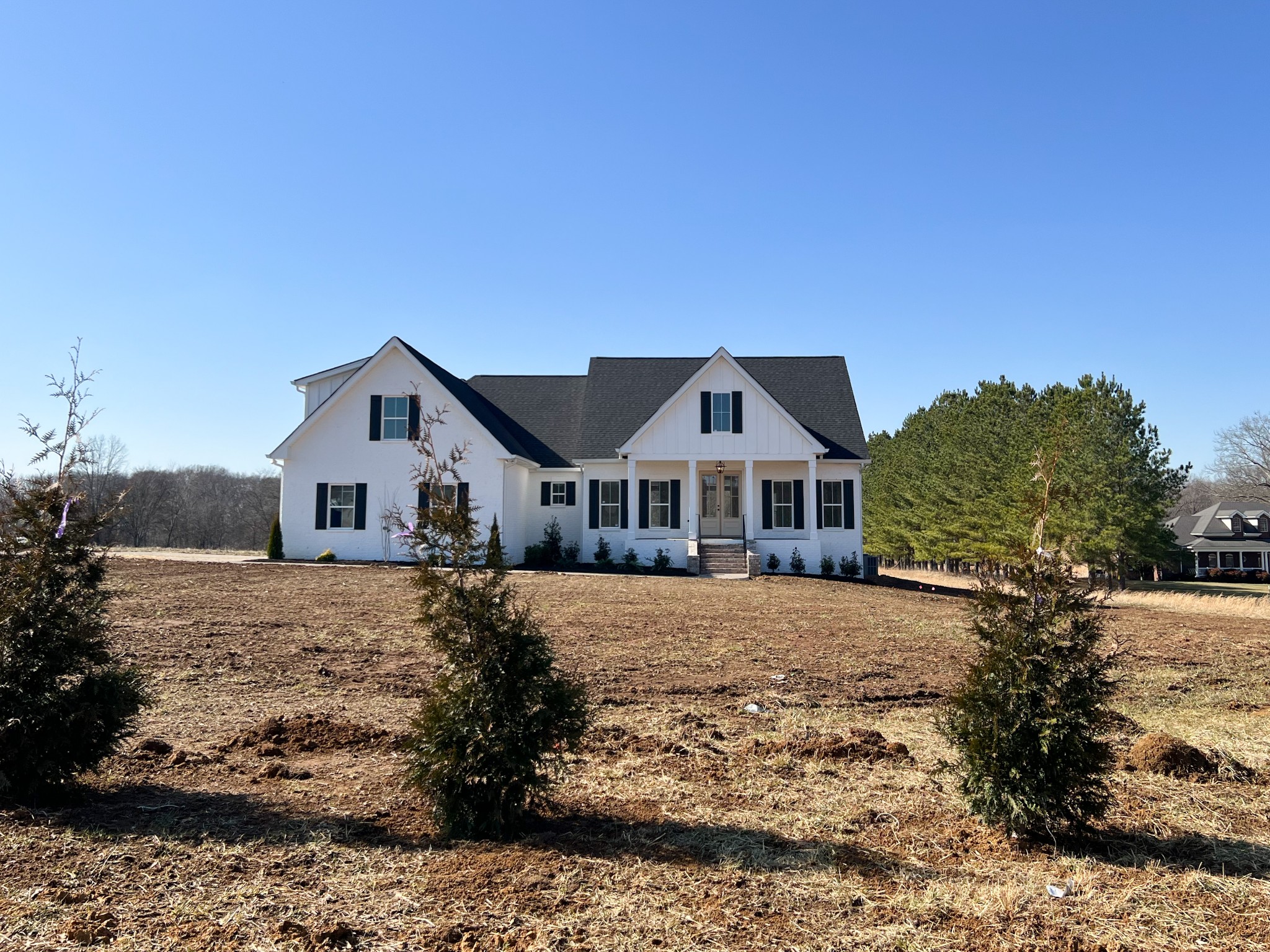 2040 Cairo Bend Road Lebanon, TN 37087 - Photo 2 of 38 a front view of a house with a yard