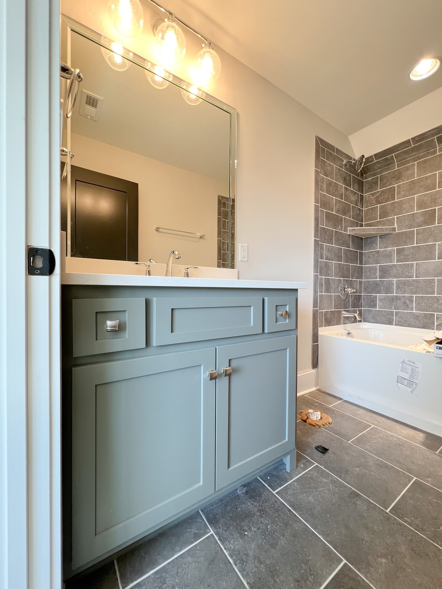 2040 Cairo Bend Road Lebanon, TN 37087 - Photo 34 of 38 a bathroom with a sink and a bathtub