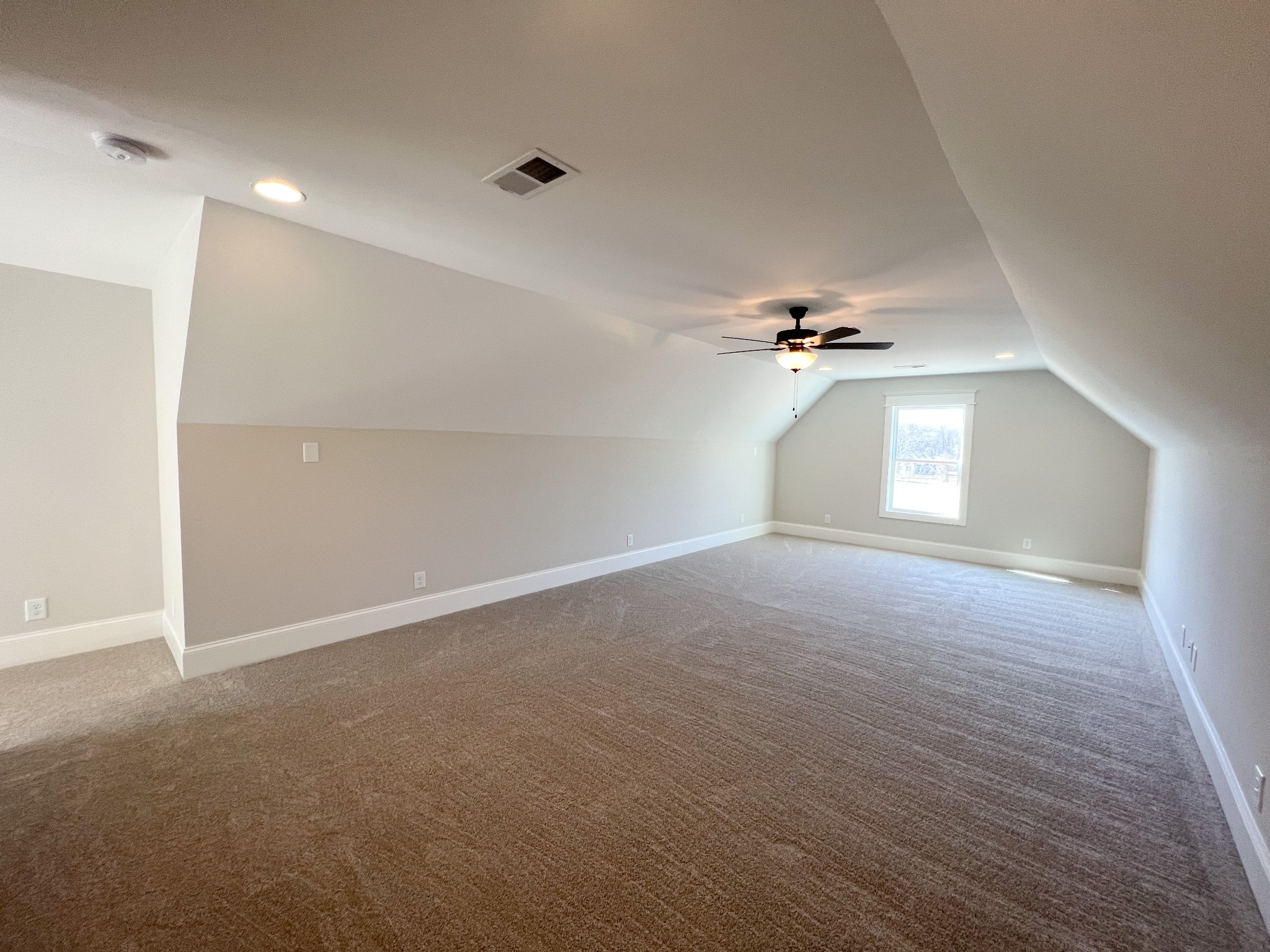 2040 Cairo Bend Road Lebanon, TN 37087 - Photo 36 of 38 an empty room with chandelier fan and windows
