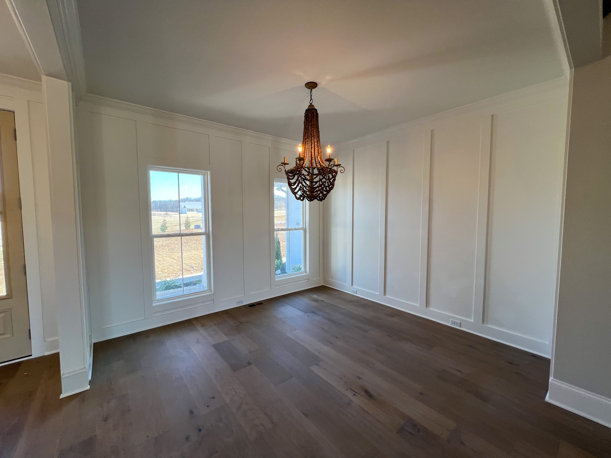 2040 Cairo Bend Road Lebanon, TN 37087 - Photo 6 of 38 a view of empty room with wooden floor and fan