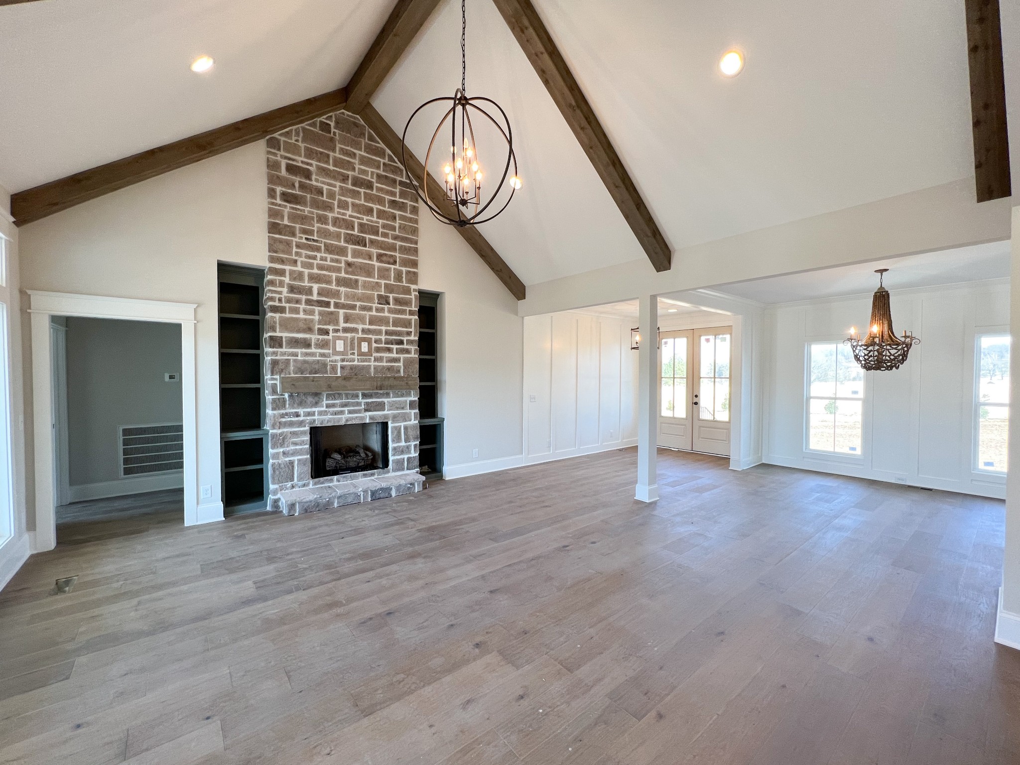 2040 Cairo Bend Road Lebanon, TN 37087 - Photo 7 of 38 an empty room with windows and fireplace