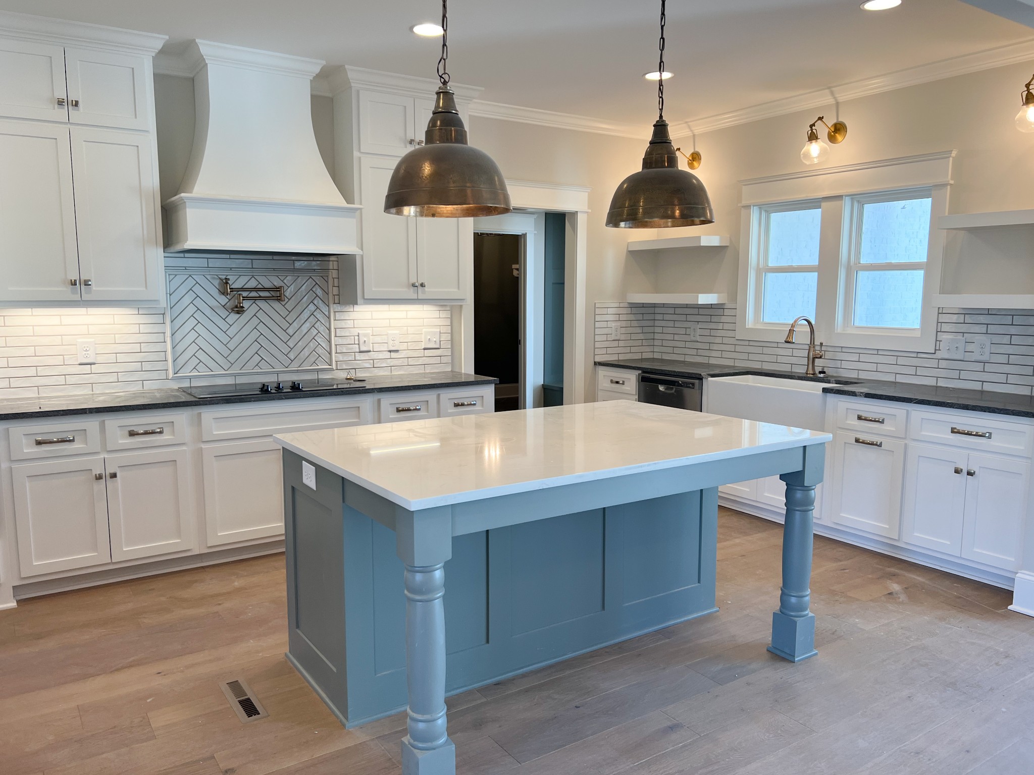 2040 Cairo Bend Road Lebanon, TN 37087 - Photo 10 of 38 a kitchen with stainless steel appliances a sink stove and cabinets