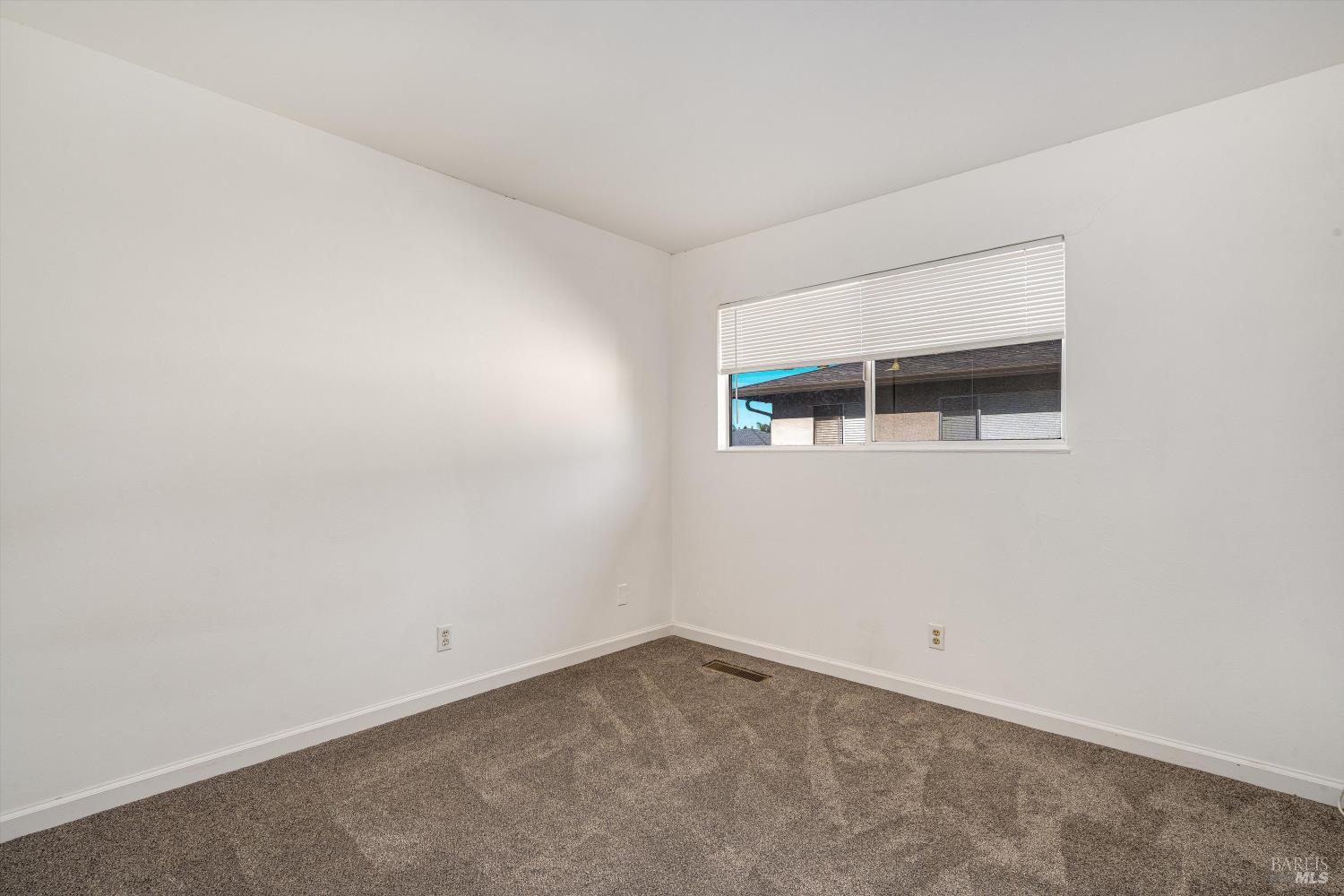 220-226 Arlen Drive Rohnert Park, CA 94928 - Photo 17 of 56 an empty room with a window