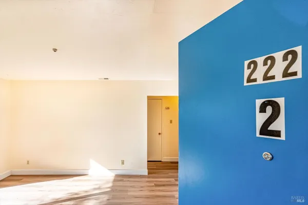 a kitchen with a refrigerator and a sink