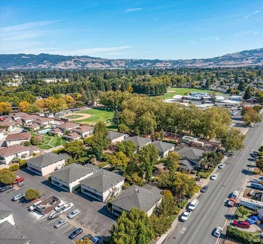 a view of a city with mountains in the background