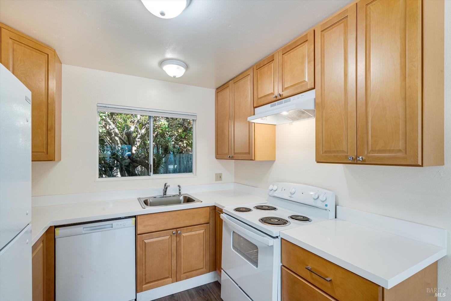 220-226 Arlen Drive Rohnert Park, CA 94928 - Photo 31 of 56 a kitchen with stainless steel appliances granite countertop a sink stove and refrigerator