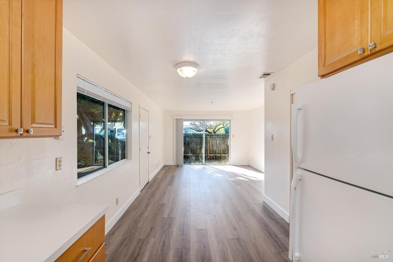220-226 Arlen Drive Rohnert Park, CA 94928 - Photo 32 of 56 a view of a hallway with wooden floors and cabinet