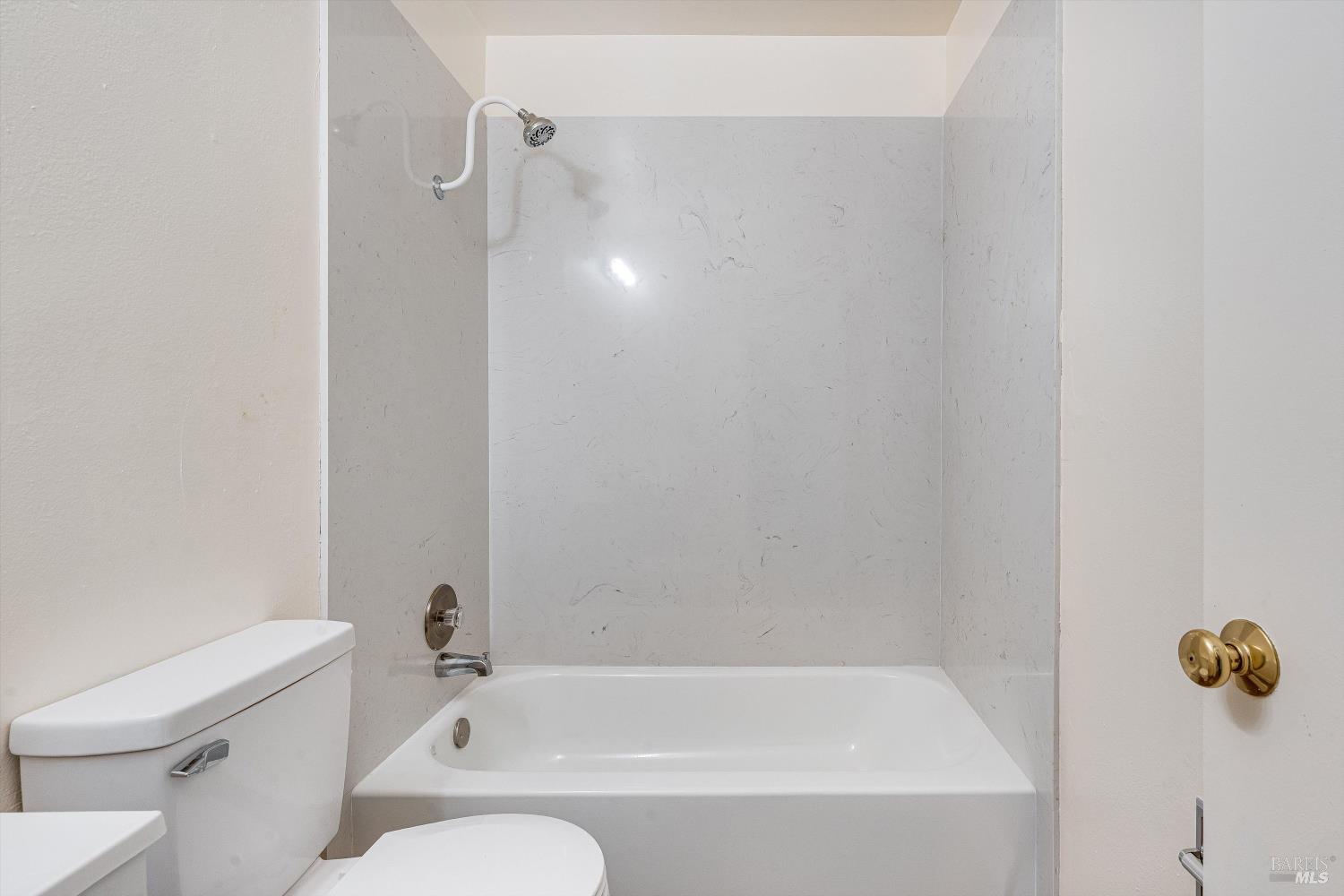 220-226 Arlen Drive Rohnert Park, CA 94928 - Photo 38 of 56 a bathroom with a bathtub and shower