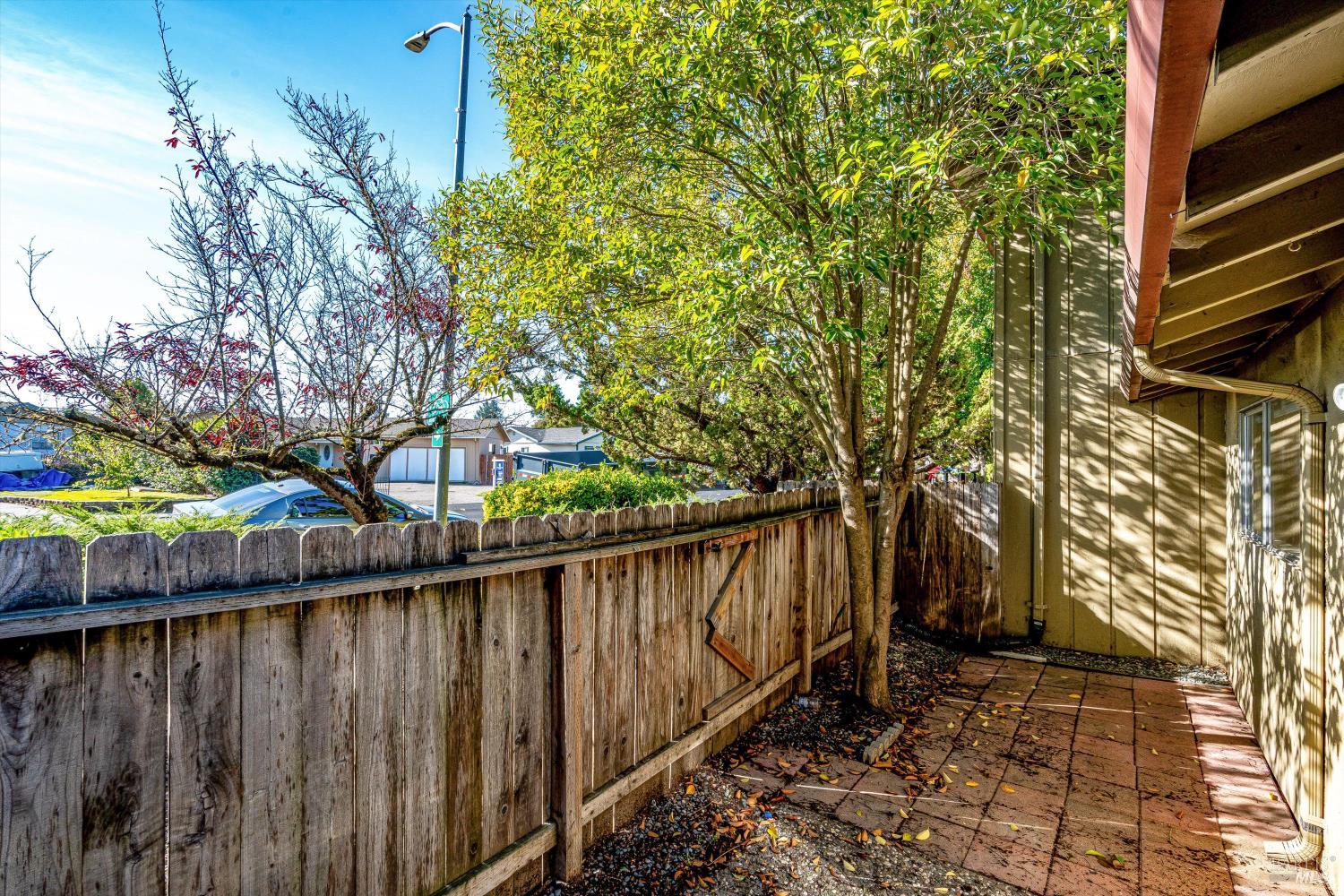 220-226 Arlen Drive Rohnert Park, CA 94928 - Photo 39 of 56 a wooden fence with trees in the background
