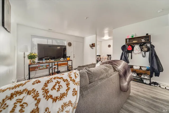 a bedroom with a bed and dresser