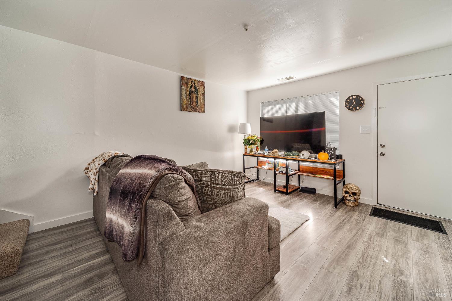 220-226 Arlen Drive Rohnert Park, CA 94928 - Photo 44 of 56 a living room with furniture and a flat screen tv