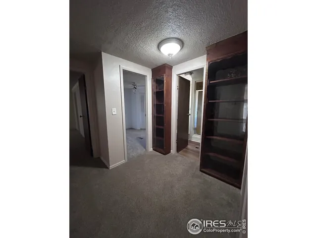 a bathroom with a sink vanity and mirror