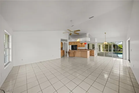 a view of kitchen with furniture and window