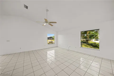 a view of an empty room and window
