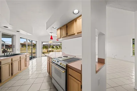 a kitchen with a sink and cabinets