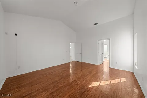 a bathroom with a double vanity sink tub and mirror