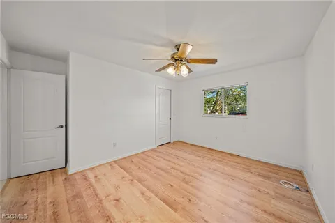 a bathroom with a shower and toilet