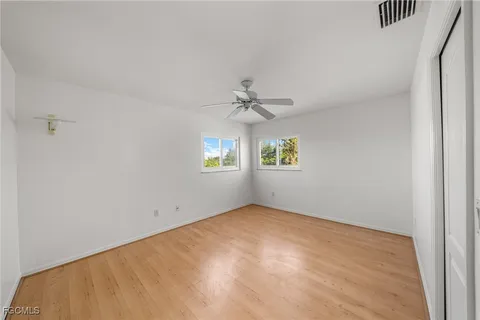 a bathroom with a shower and a toilet