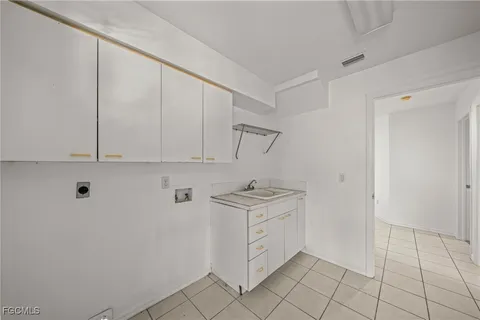 a swimming pool with outdoor seating and yard