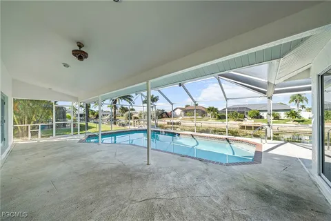 a view of a house with a swimming pool