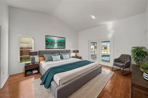 a bedroom with a bed and a couch