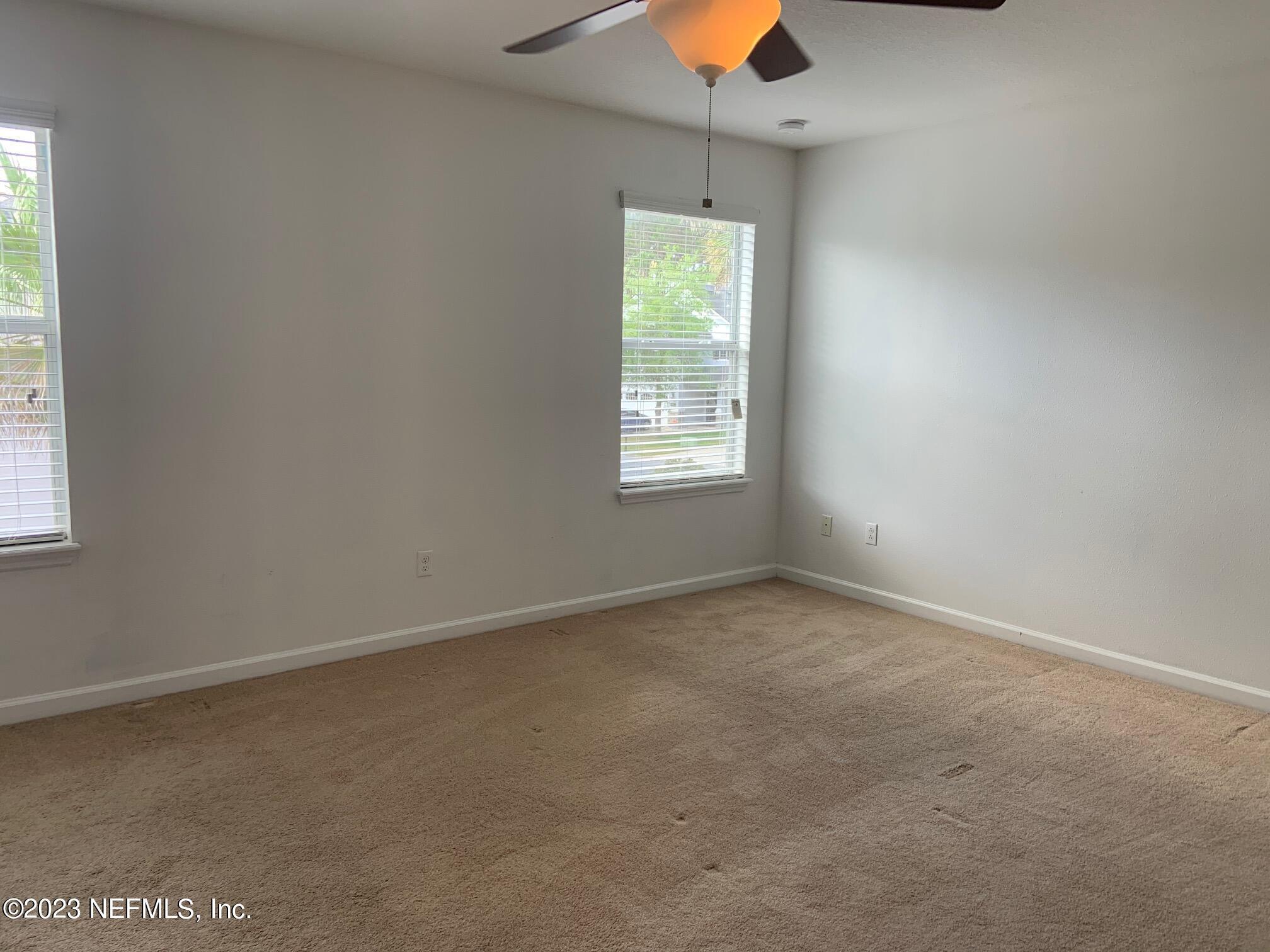 3863 Chasing Falls Road Orange Park, FL 32065 - Photo 21 of 32 an empty room with a window