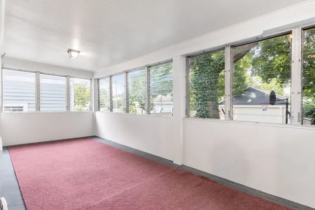 a bathroom with bathtub and shower