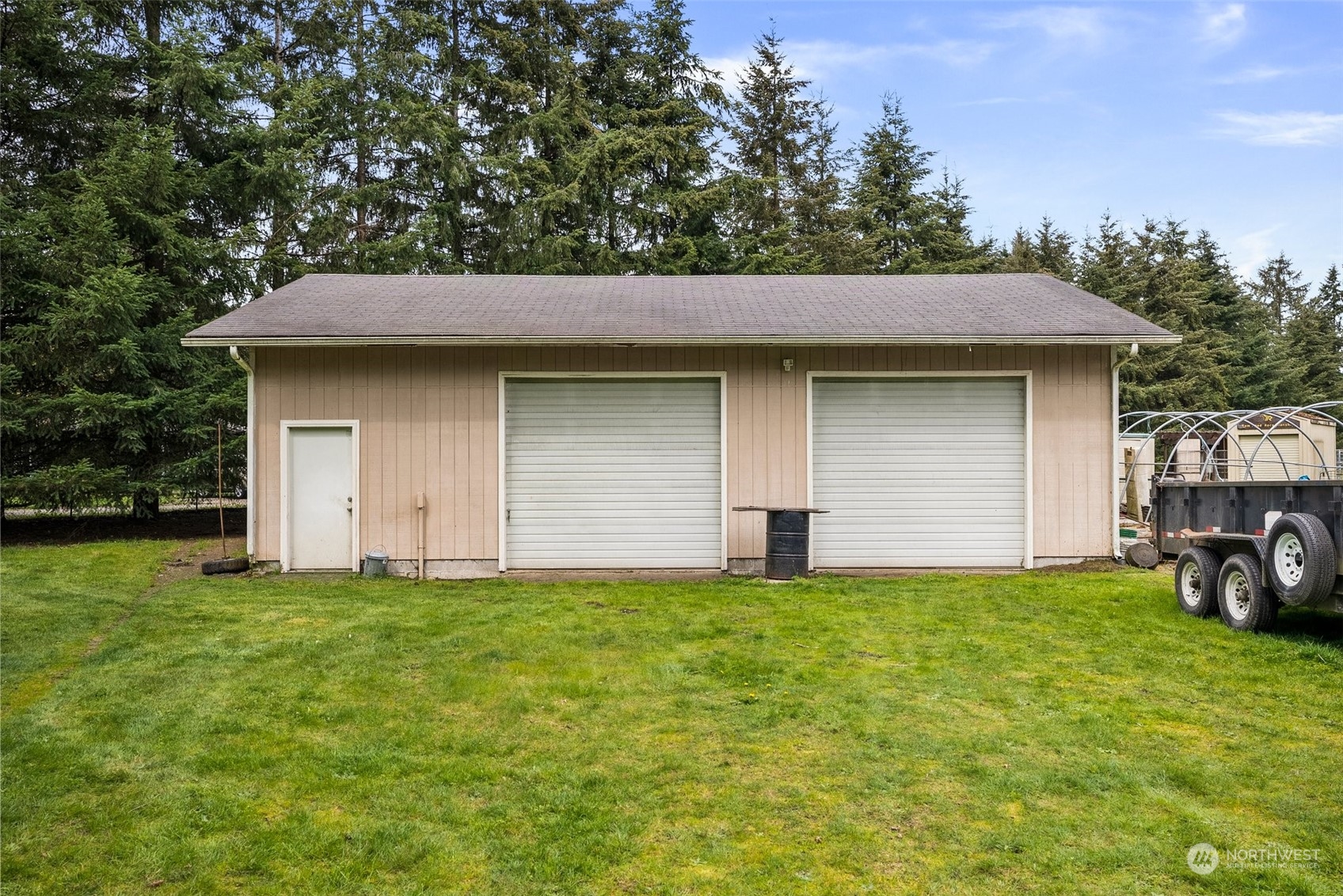 10104 Albany Place Southwest Rochester, WA 98579 - Photo 24 of 31 a house with a yard